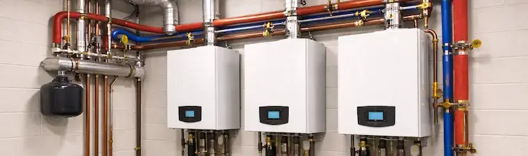 commercial cascade boiler system mechanical room.webp