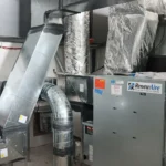 commercial ventilation system installation mechanical room.webp