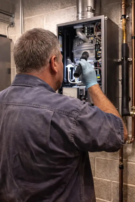 wall mounted boiler service inspection technician.webp